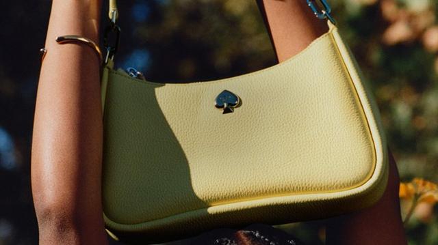 a picture of a butterfly and a purse on a teddy bear