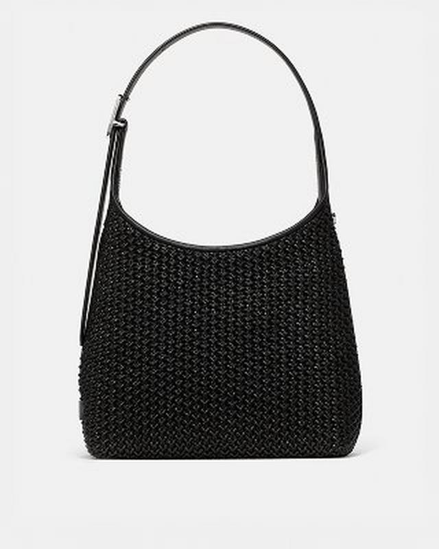 Black woven shoulder bag with leather strap and curved hobo silhouette.