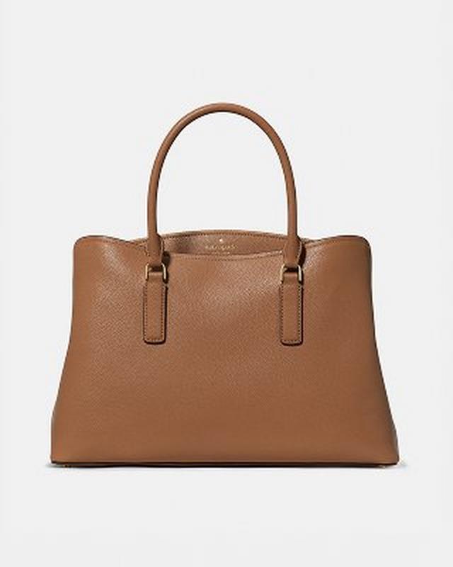 Tan leather tote bag with dual top handles and structured silhouette.