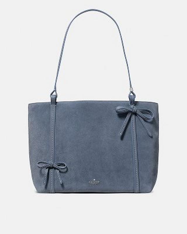Kate Spade pink leather tote bag with shoulder strap displayed front-facing.