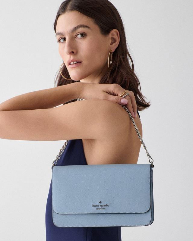 DOTD MAIN MEDIA - woman with a blue shoulder bag