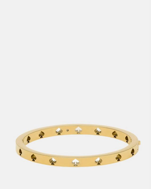 Person holding a gift box behind their back