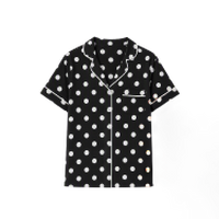 Black short-sleeve pajama shirt with white polka dots and chest pocket.