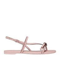 Pink jelly sandals with ankle strap and bow detail at the toe.