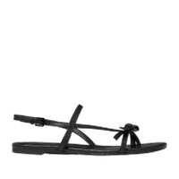 Black strappy flat sandal with bow detail and ankle strap.